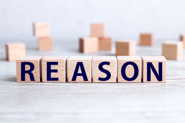 REASONと書かれた積木